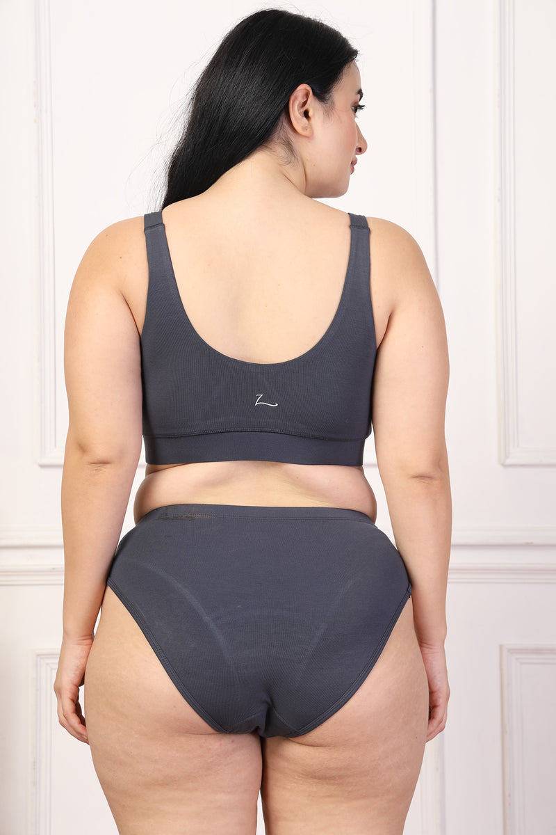 Back view shows wide supportive straps and hook-and-eye closure for fit.