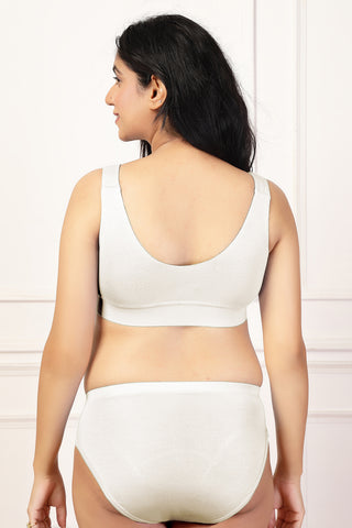 Off White Feeding Bra; fixed pads eliminate movement for consistent shape and structure.