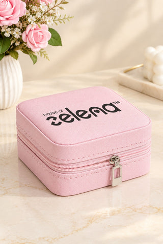 Makeup & Jewellery Organizer Box, lifestyle image: zip-around pink travel box with Zelena logo, ring rolls | House of Zelena