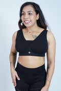 Interior view of Black Bra cups; fixed padding ensures smooth shape and modesty under clothing.