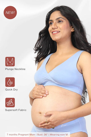 Full shot displays bra structure and fit under clothing.