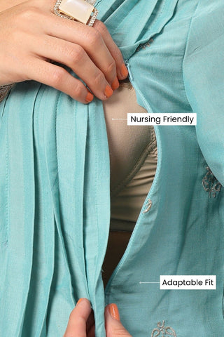 High-quality image of the Polyester texture and finish of the Elegant Turquoise Festive Suit Set.