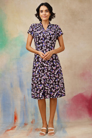 Woman wearing Ditsy Floral Print Maternity Nursing Dress in Black - Pre & Post Pregnancy