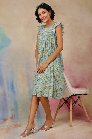 Back View of Ditsy Blue Floral Bloom Zip Feeding Dress - Flattering Silhouette for Pregnancy