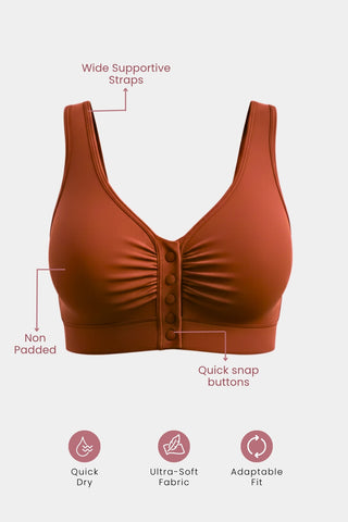 Model wearing Rust Bra; construction allows movement without restriction.