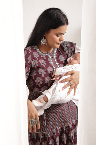 Styled look of the Ethnic Cotton Tiered Kurti for Feeding Kurti with matching pants and accessories.