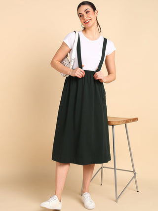 Bottle Green Skirt; adjustable strap and waistband adapt to the body's changing size.