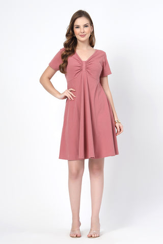 Woman wearing Ruched Cotton Zipless Feeding Dress in Deep Salmon - Pre & Post Pregnancy