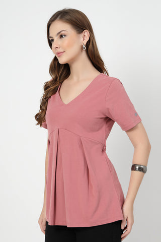 Smooth back view of pink Maternity Tops showing silhouette for comfort.