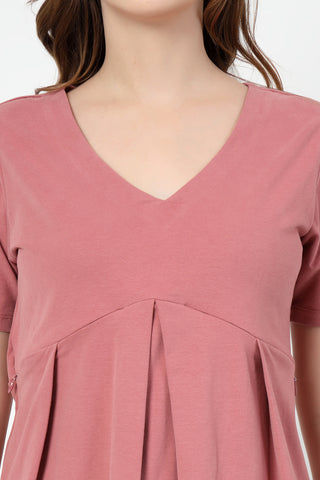 New mom wearing pink Maternity Tops; shows flattering post-delivery fit and Long Zip.