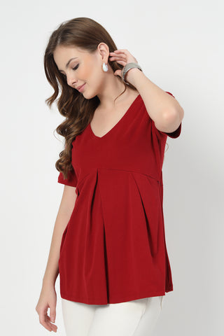 Smooth back view of red Maternity Tops showing silhouette for comfort.