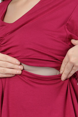 Model wears onion-pink Maternity Tops; stylish maternity fit with Zip function.