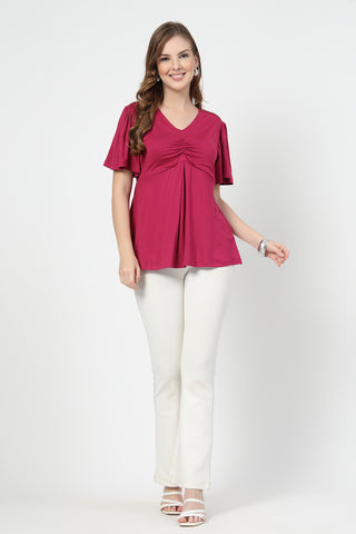 Close-up texture of Feeding top with in-built bra - Deep Rose in onion-pink, showing the soft Viscose fabric.