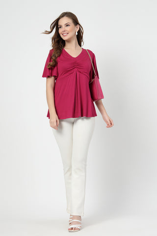 Styling detail of Feeding top with in-built bra - Deep Rose, highlighting onion-pink print and Maternity Tops design.