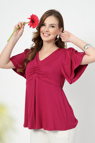 Smooth back view of onion-pink Maternity Tops showing silhouette for comfort.