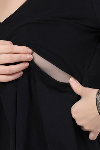 Model wears black Maternity Tops; stylish maternity fit with Long Zip function.