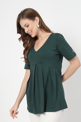 Smooth back view of bottle-green Maternity Tops showing silhouette for comfort.