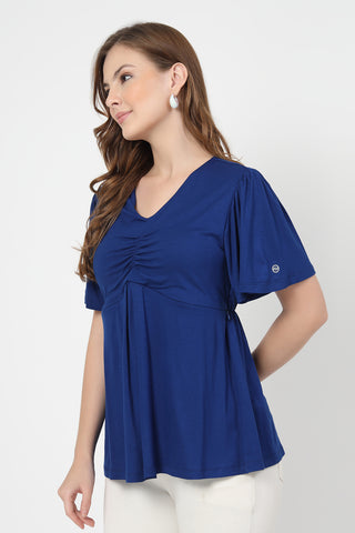Smooth back view of blue Maternity Tops showing silhouette for comfort.