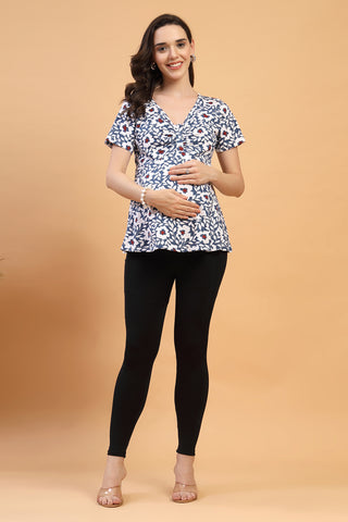 Detail shot of Cotton fabric; shows stretch and navy-blue color/print.