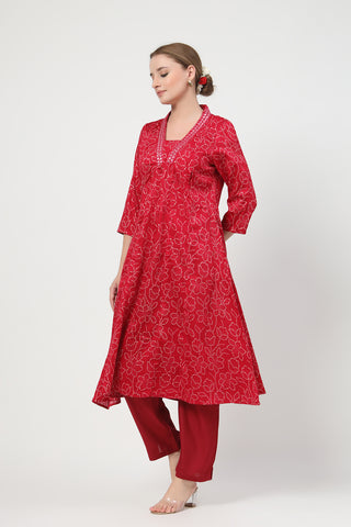 Model action shot of the Embroidered Floral Foil Kurta Set, demonstrating ease of movement and fit.
