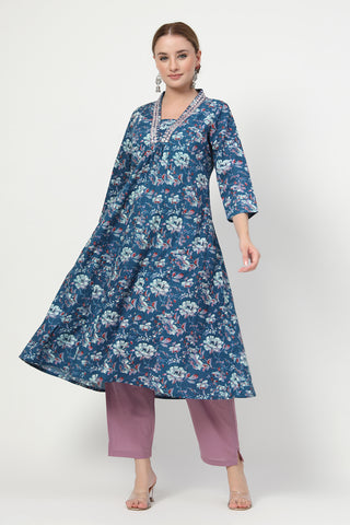 Model action shot of the Embroidered Floral Cotton Kurta Set, demonstrating ease of movement and fit.