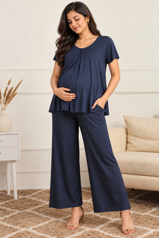 Zipless Top & Maternity Pajama Set in Navy, maternity view: on bump with hand in pocket, zipless nursing top | Zelena