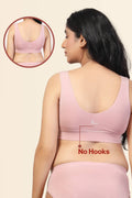 Back view shows wide supportive straps and hook-and-eye closure for fit.