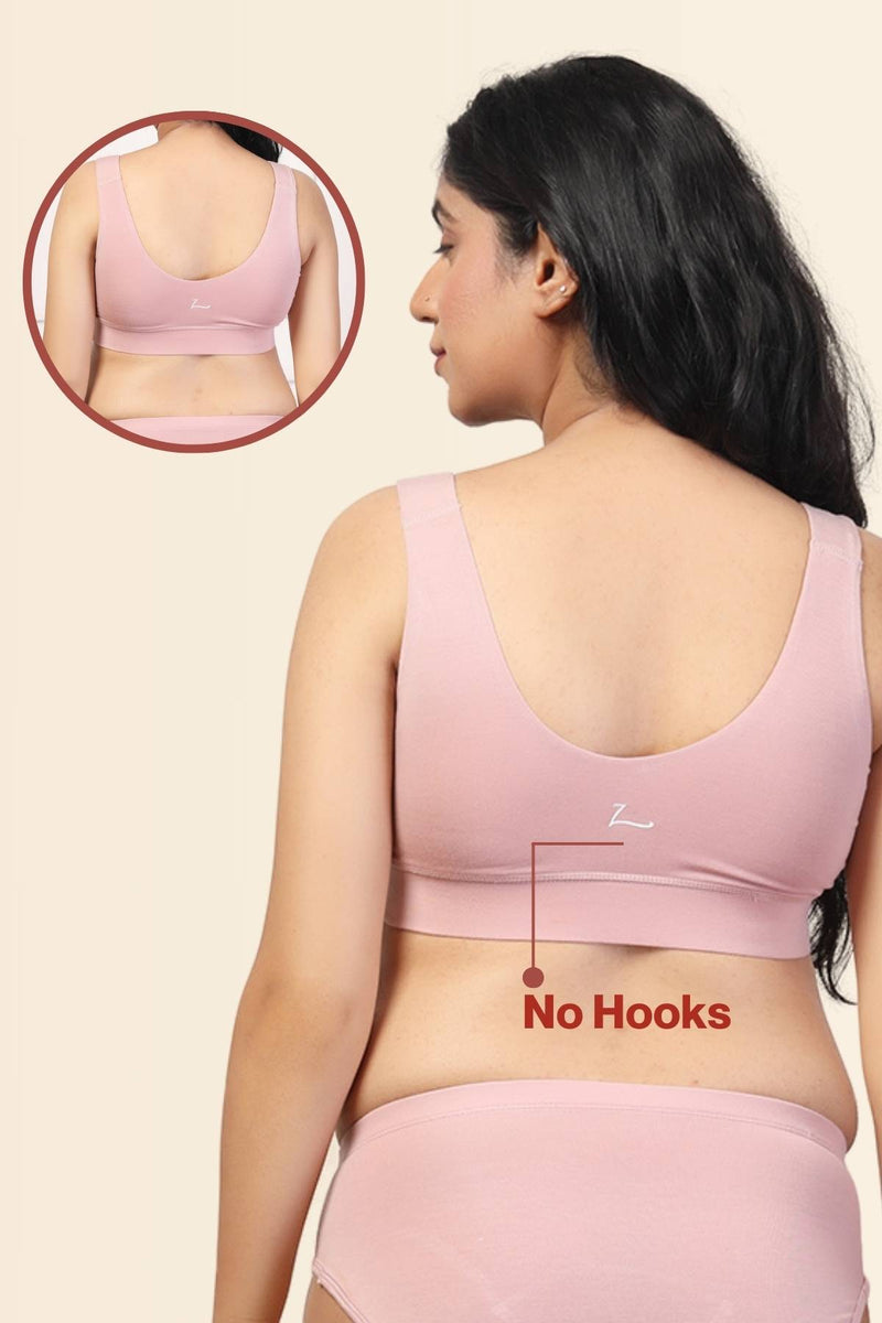 Back view shows wide supportive straps and hook-and-eye closure for fit.