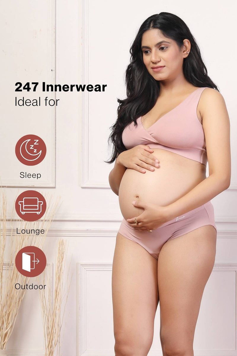 Full shot displays bra structure and fit under clothing.