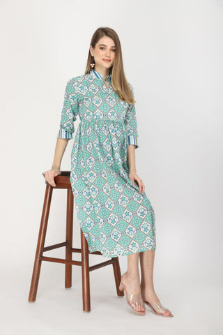 Model posing, highlighting the accessible discreet nursing zips of the Teal and white feeding & maternity Kurtis Kurti.