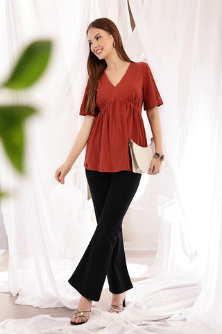 Rust V-Neck Top; neckline offers comfortable and unrestricted movement.