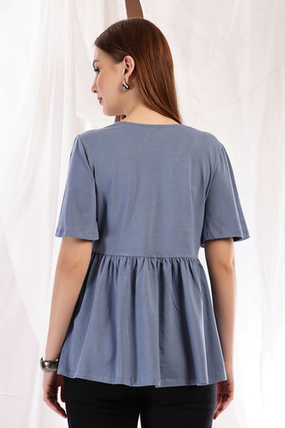 Side view of M Blue Top; ensures proper fit and room for pregnancy growth.