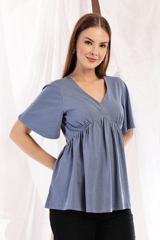 M Blue Top short sleeve detail; sleeve length provides arm coverage.