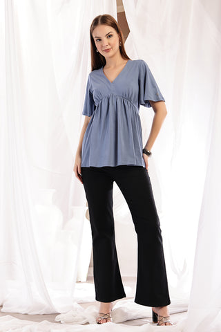 Back view of M Blue Top; full coverage ensures modesty.