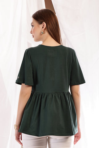 Side view of Bottle Green Top; ensures proper fit and room for pregnancy growth.