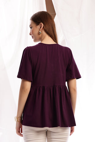 Side view of Plum Top; ensures proper fit and room for pregnancy growth.