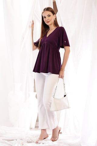 Back view of Plum Top; full coverage ensures modesty.