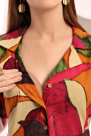 Model wearing Tropical Leaf Shirtdress; dress offers full coverage and movement.