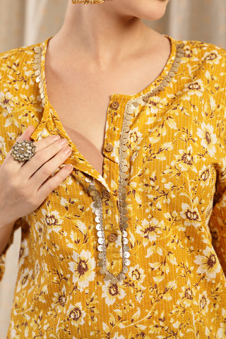 Model wearing Gold Top; garment provides coverage and fit for a changing body.