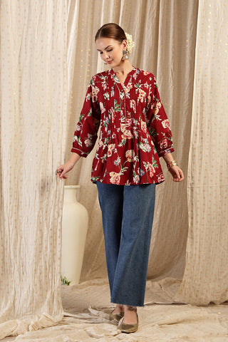 Maroon fabric texture; provides comfort and lightweight wear.