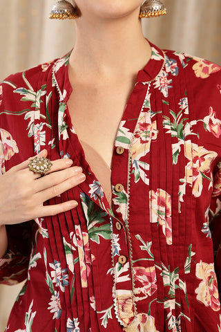 Model wearing Maroon Top; garment provides coverage and shape for a changing body.