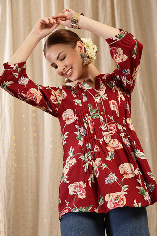 Maroon Top length; covers hips for modesty during pregnancy.