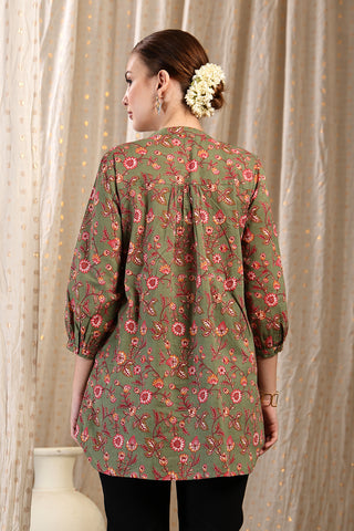 Close-up of apple-green Maternity Tops showing Zipless for easy nursing access.