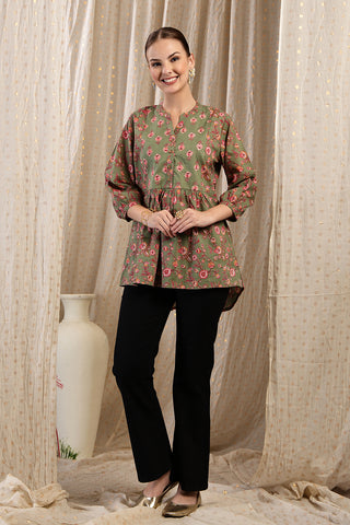 Smooth back view of apple-green Maternity Tops showing silhouette for comfort.