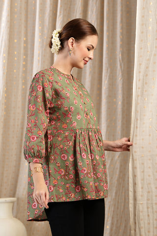 Side or angle view of Maternity Zipless Feeding Peplum Top - Sage showing the Maternity Tops silhouette and fit.