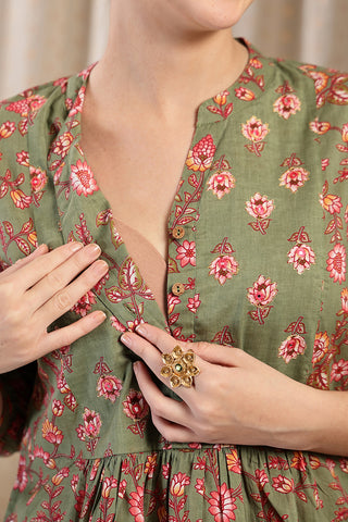 Model wears apple-green Maternity Tops; stylish maternity fit with Zipless function.