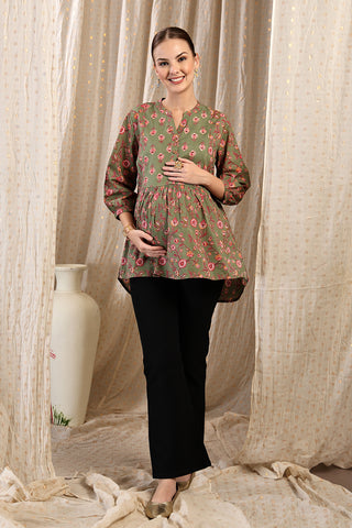 Detailed view of Maternity Zipless Feeding Peplum Top - Sage Zipless access and Cotton construction.