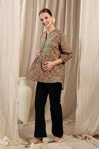 Detail shot of Cotton fabric; shows stretch and apple-green color/print.