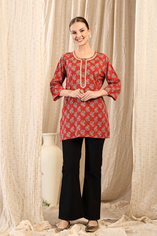 Model wearing Red Top; long top provides modesty and coverage.