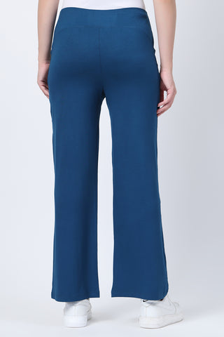 Model wearing Deep Teal Pants; high waist band covers belly for full support.